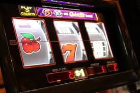 Slot game interface on mikigaming showing reels, paylines, and bet controls on mobile screen